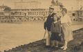 Familie vor Uferfassaden