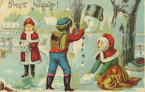 Kinder bauen Schneemann