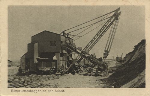 Eimerkettenbagger an der Arbeit