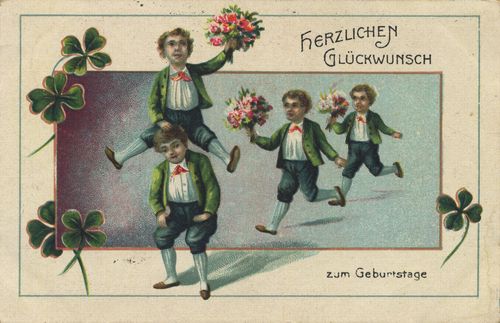 4 Jungen mit Blumen und Gl�cksklee