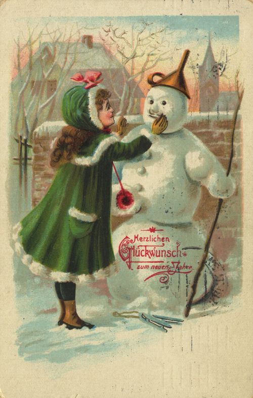 M�dchen schm�ckt Schneemann