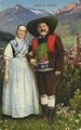 Meraner Paar vor Bergkulisse