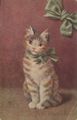 Getigerte Katze mit gr�ner Schleife