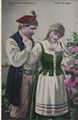 T�ndelndes Bauernpaar in Festtracht